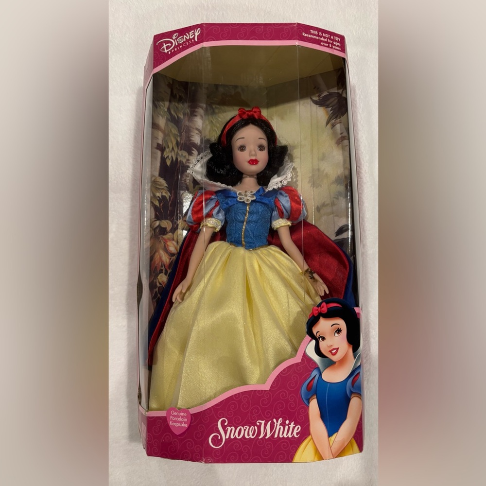 Disney Snow White Porcelain Doll with Red, Blue, and Yellow Dress
